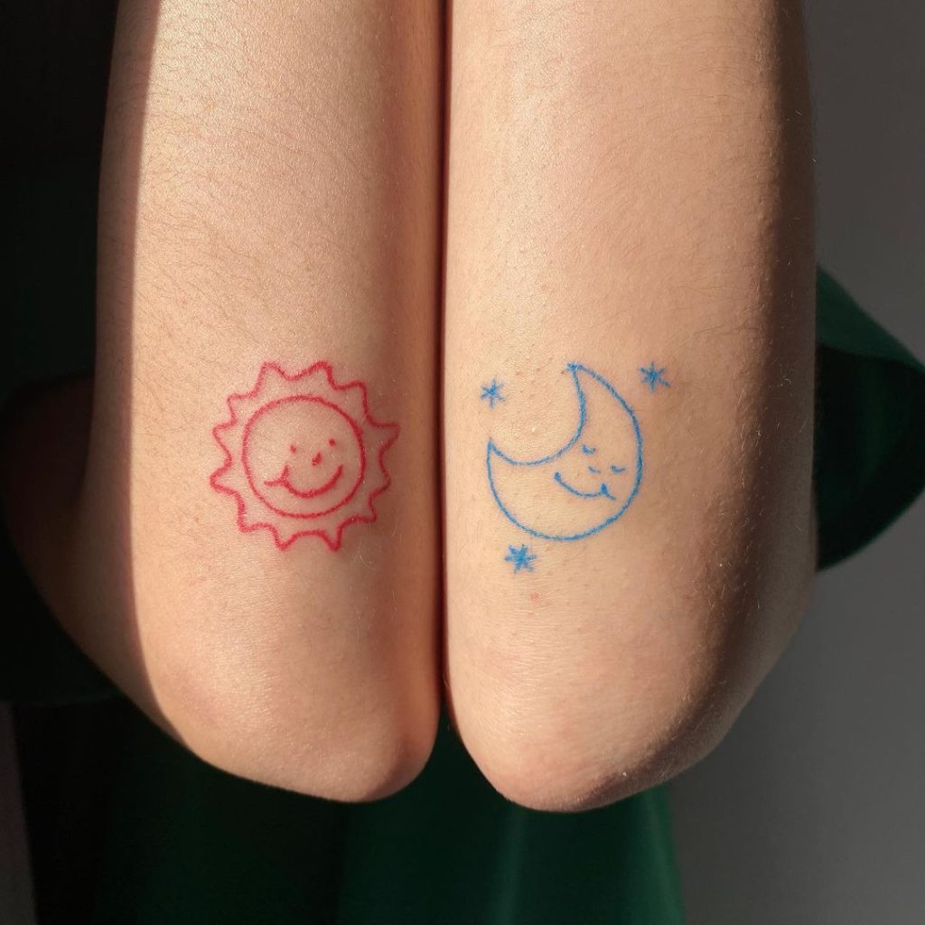 ポップな太陽と月のタトゥー